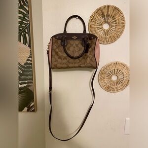 Selling because don’t use anymore

Coach purse long handle and short handles